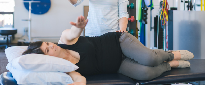woman receiving physical therapy during pregnancy